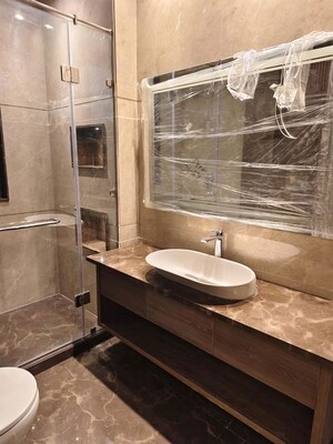 Bathroom in 4 BHK Builder Floor at Sukhdev Vihar – for Sale