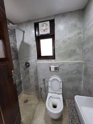 Bathroom in 2 BHK Builder Floor at Kalkaji – for Rent