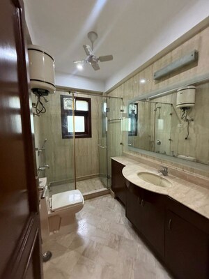Bathroom in 3 BHK Builder Floor at Nehru Enclave – for Rent