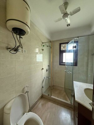 Bathroom in 3 BHK Builder Floor at Nehru Enclave – for Rent