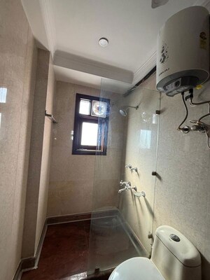 Bathroom in 3 BHK Builder Floor at Nehru Enclave – for Rent