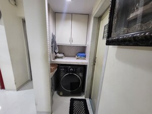 Laundry Area in 2 BHK Apartment at Prestige Residency Pinewood, Ghodbunder Road – for Sale