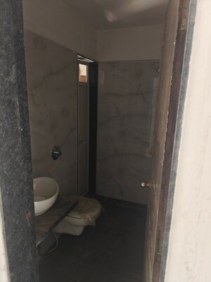 Bathroom in 2 BHK Apartment at Anant Metropolis Insignia Towers, Kasarvadavali – for Sale