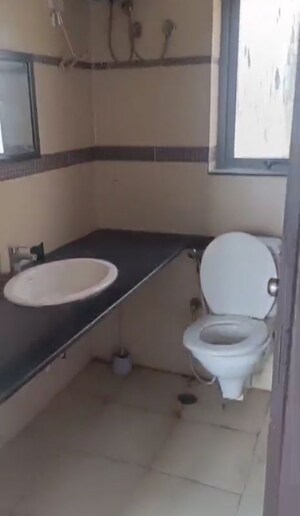 Bathroom in 2 BHK Apartment at Unitech Uniworld Gardens 2, Sector 47 – for Rent