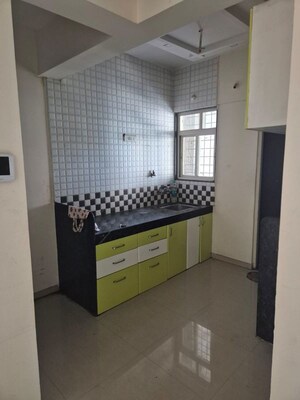 Kitchen in 2.5 BHK Apartment at Tanish Orchid, Charholi Budruk – for Sale