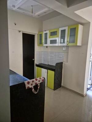 Kitchen in 2.5 BHK Apartment at Tanish Orchid, Charholi Budruk – for Sale