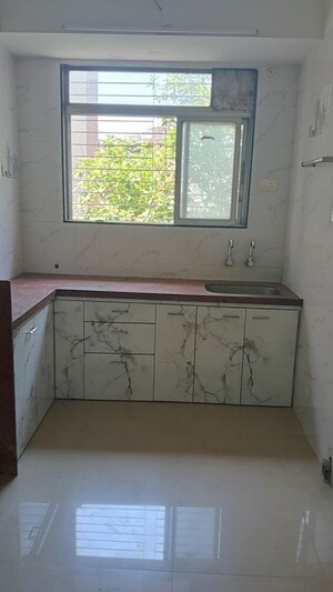 Kitchen in 1 BHK Apartment at Himalaya Chhaya CHS, Dombivli West – for Sale