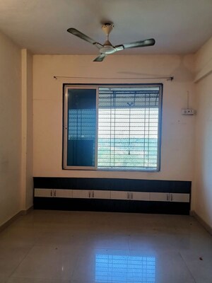 Bedroom in 1 BHK Apartment at Rishabh Heights CHS, Dombivli West – for Sale
