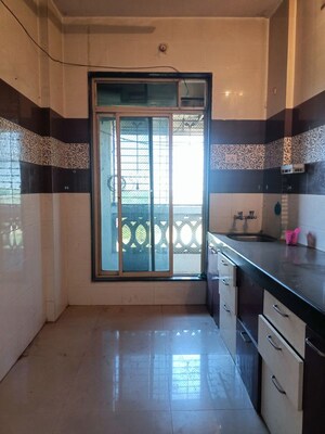 Kitchen in 1 BHK Apartment at Rishabh Heights CHS, Dombivli West – for Sale