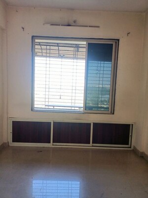 Bedroom in 1 BHK Apartment at Rishabh Heights CHS, Dombivli West – for Sale