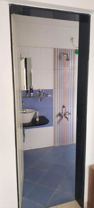 Bathroom in 3 BHK Apartment at Swiss County, Thergaon – for Rent