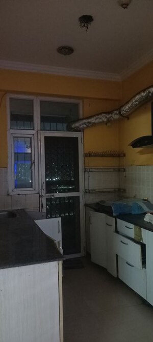 Kitchen in 2 BHK Apartment at Panchsheel Wellington, Dundahera – for Rent