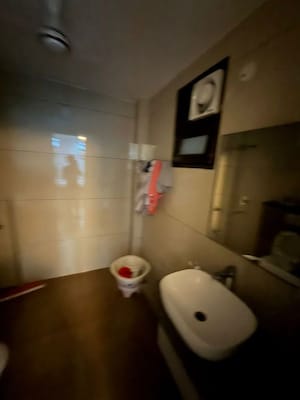 Bathroom in 3 BHK Apartment at Puri Aman Vilas, Sector 89 – for Rent