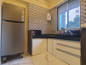 Kitchen in 2 BHK Apartment at Anand Vihar Society, Khar West – for Rent