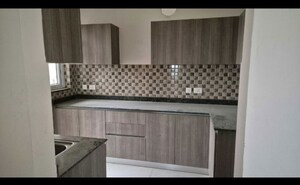 Kitchen in 3 BHK Apartment at Adani M2K Oyster Grande, Sector 102 – for Sale