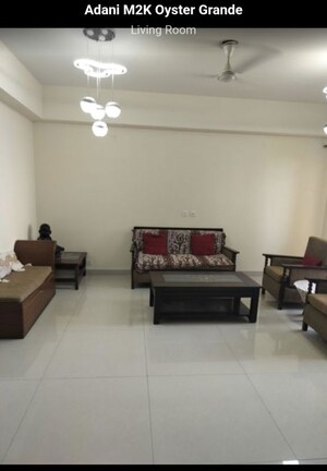 Living Room in 3 BHK Apartment at Adani M2K Oyster Grande, Sector 102 – for Sale