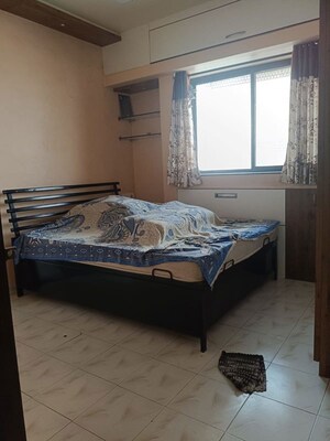 Bedroom in 2 BHK Apartment at Mittal Sun Aura, Sinhagad Road – for Rent
