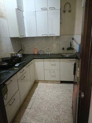 Kitchen in 2 BHK Villa at RWA Apartments, Sector 31 – for Rent