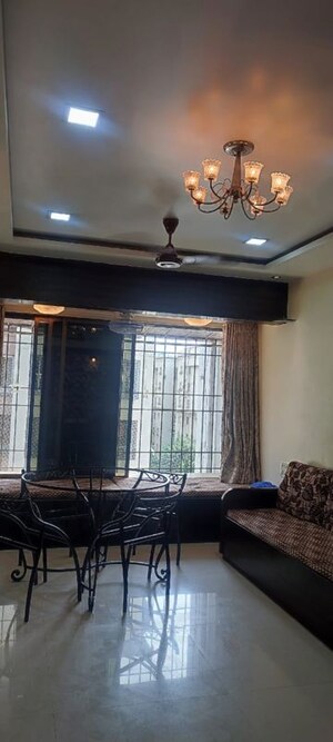 Living Room in 2 BHK Apartment at Kshitij CHS, Goregaon East – for Rent