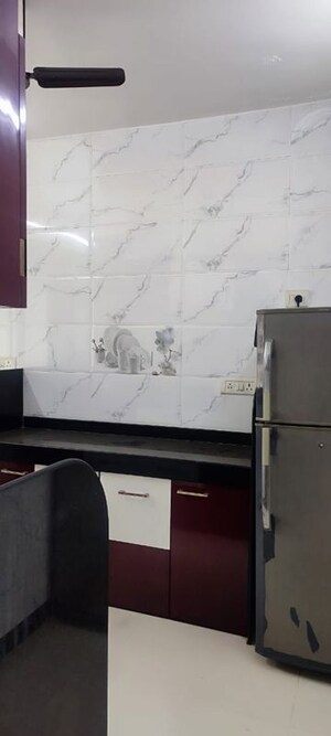 Kitchen in 2 BHK Apartment at Kshitij CHS, Goregaon East – for Rent