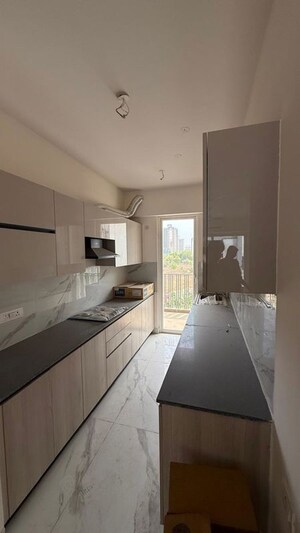 Kitchen in 2.5 BHK Apartment at Smart World Gems, Sector 89 – for Rent