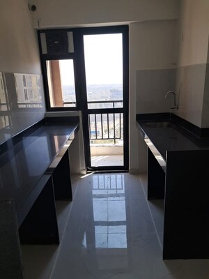 Kitchen in 1 BHK Apartment at Runwal Gardens, Dombivli East – for Rent