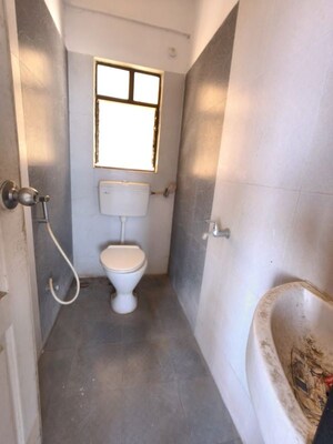 Bathroom in 3 BHK Apartment at Kolte Patil Margosa Heights, Mohammadwadi – for Rent