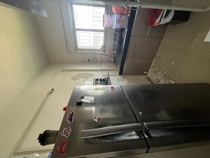 Kitchen in 2 BHK Builder Floor at Kumar Primavera, Wadgaon Sheri – for Rent