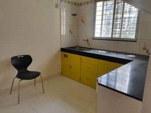 Kitchen in 2 BHK Apartment at Wadgaon Sheri – for Rent
