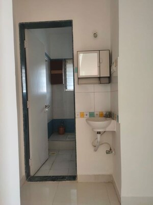 Bathroom in 2 BHK Apartment at Wadgaon Sheri – for Rent