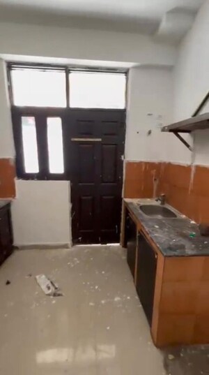 Kitchen in 2 BHK Apartment at Charms Solitaire Ghaziabad, Ahinsa Khand 2 – for Sale