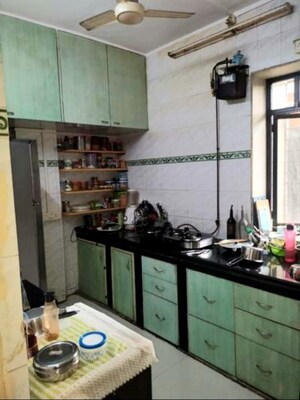 Kitchen in 2 BHK Apartment at Sai Dham CHS Mulund West, Mulund West – for Rent