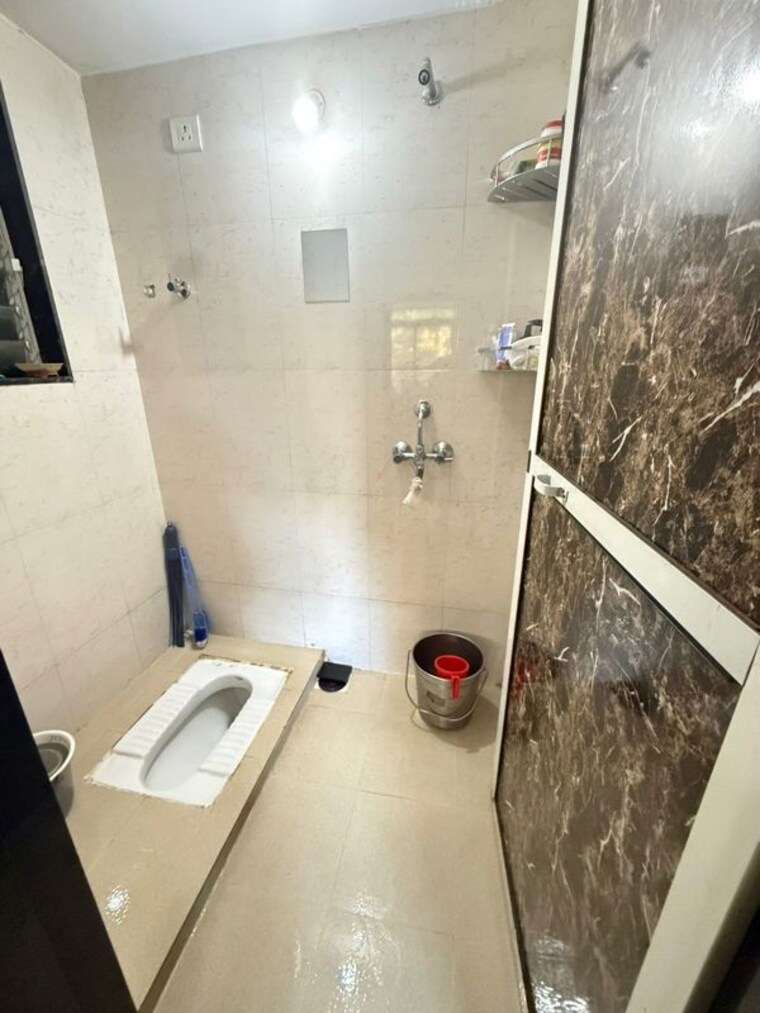 Bathroom, vardhman nagar 1 Bedroom 320 Sq.Ft. Apartment In Vardhman Nagar Mumbai 10239851