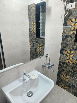 Bathroom in 2 BHK Apartment at Riddhi Garden, Malad East – for Rent