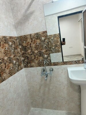 Bathroom in 2 BHK Apartment at Riddhi Garden, Malad East – for Rent