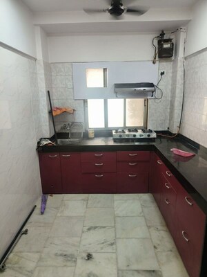 Kitchen in 2 BHK Apartment at Riddhi Garden, Malad East – for Rent