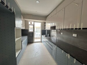 Kitchen in 4 BHK Builder Floor at Adani Samsara Vilasa, Sector 63 – for Sale