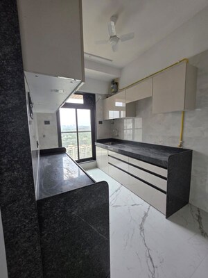 Kitchen in 3 BHK Apartment at H Rishabraj Serenity Decks, Goregaon East – for Rent