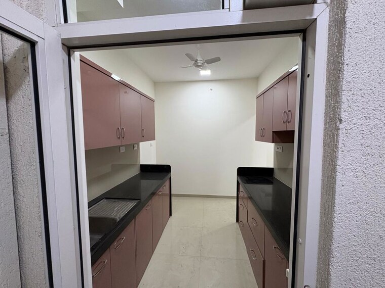 Kitchen, lodha-belmondo 2 Bedroom 1000 Sq.Ft. Apartment In Gahunje Pune 10240375