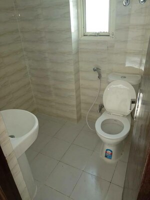 Bathroom in 2 BHK Apartment at VVIP Homes, Gaur City 2 – for Rent