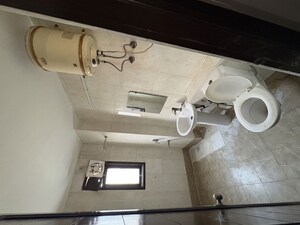 Washroom in 4 BHK Builder Floor at Jasola – for Rent