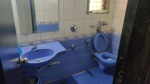 Bathroom in 2 BHK Apartment at Raj Rudram Apartments, Goregaon East – for Rent