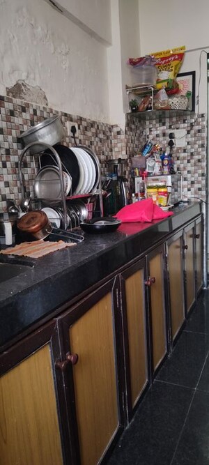 Kitchen in 1.5 BHK Apartment at N G Garden, Kandivali West – for Sale