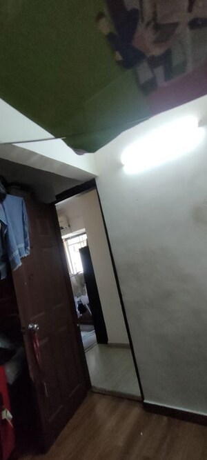 Building Lobby in 1.5 BHK Apartment at N G Garden, Kandivali West – for Sale