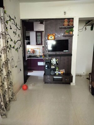 Living Room in 1 BHK Apartment at Ravinanda Skylights, Wagholi – for Rent