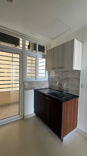 Kitchen in 3 BHK Apartment at Wave Amore, Sector 32 – for Sale