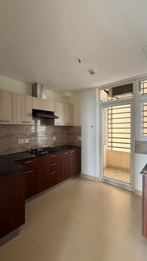 Kitchen in 3 BHK Apartment at Wave Amore, Sector 32 – for Sale