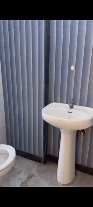 Bathroom in 1 BHK Apartment at Vertex Ashok Smruti, Kasarvadavali – for Rent