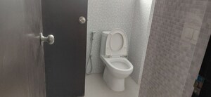 Bathroom in 3 BHK Apartment at Tulsiani Urban Woods, Sushant Golf City – for Rent