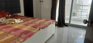 Bedroom in 3 BHK Apartment at Tulsiani Urban Woods, Sushant Golf City – for Rent